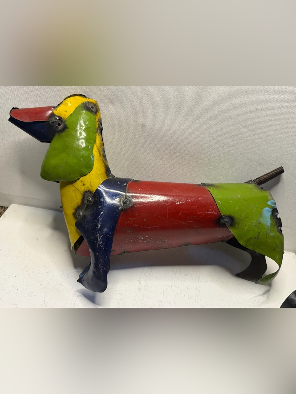Recycled metal dachshund garden sculpture
